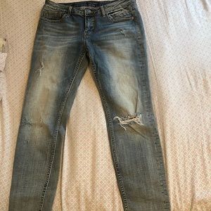 Cute ripped skinny jeans. Never before worn. Perfect addition to any closet